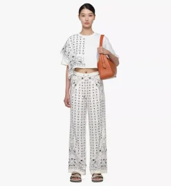 Aren Flap Hobo In Embossed Monogram Leather