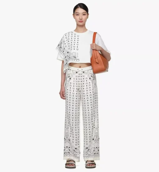 Aren Flap Hobo In Embossed Monogram Leather