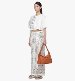Aren Flap Hobo In Embossed Monogram Leather