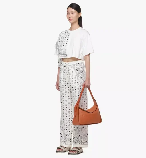 Aren Flap Hobo In Embossed Monogram Leather